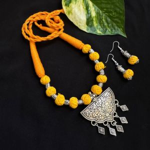 Mustard Yellow Cotton Thread Beads Necklace With Oxidised Silver Pendant