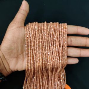 Cubic Zirconia Beads, CZ Or Czech Beads, Blush peach (Lighter Shade) with a soft metallic (champagne-rose) sheen