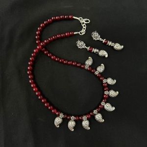 Maroon Glass Beads Necklace With Kohlapuri Charms