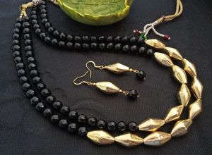 Agate necklace,2 strands with golden dholki beads,black