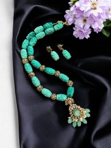 Synthetic coral carved beads with Victorian pendant with matching earrings , Sea Green