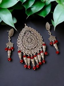 Oxidised pendant with crystal drops and matching earrings,Red