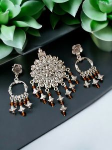 Oxidised pendant with crystal and charm drops and matching earrings