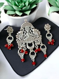 Oxidised pendant with Crystal and charm drops and matching earrings