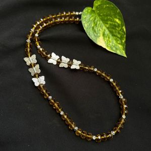 Honey Brown Crystal Necklace With Butterfly Spacers