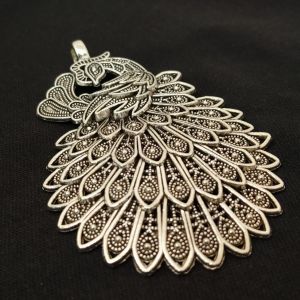 Antique silver metal pendant, Peacock