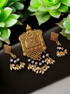 Oxidised pendant with crystals and Loreals and matching earrings , Gold