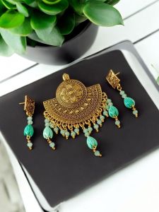 Oxidised pendant with crystals and Coral Tulip and matching earrings , Gold
