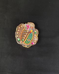 Onyx Pendant Features a Tanjore Painting on Onyx Stones Detailed with Gold Foil Borders
