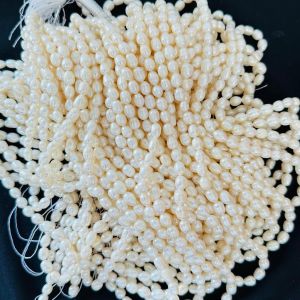 Navrabeads 15 inch AAA cream oval freshwater pearls 7-9mm for jewellery making necklaces and earrings