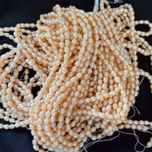 AAA Quality Fresh Water Pearls, Oval, 7-9mm, Peach