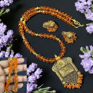 Crystals with Antique Gold pendant Necklace with Jhumkas Orange