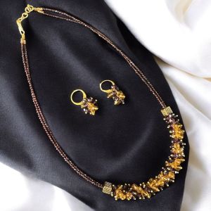 Crystal necklace with purple and gold 