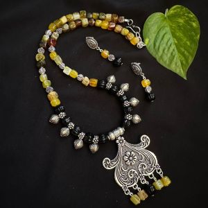 Onyx and Kohlapuri charms in oxidised silver pendant Neklace 