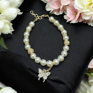 Swarovski replica pearl bracelet with CZ balls and charms 