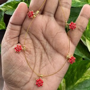 AD Flower Pendant In Invisible Wire ,Red