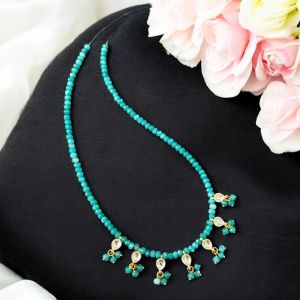 Jadau charms with sea green agates
