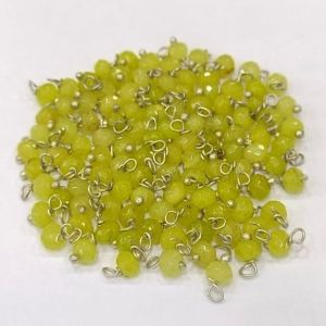 Agate Rondelle Loreals, 4x2mm, Silver Finish, (fluorescent green), Pack Of 50 Pcs