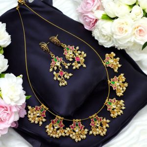 Jadau lotus in Invisible Wire With Matching Earrings
