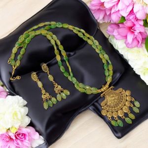 Printed glass beads necklace with oxidised gold pendants,Green