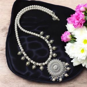 Swarovski replica pearls with Kohlapuri charms