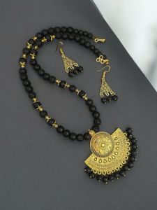 Lava beads necklace with oxidised gold pendant