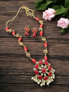 Taiwan coral beads with Antique gold beads and CZ pendant