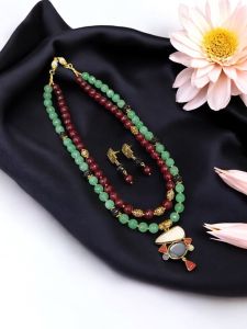 Gemstone pendant with onyx beads and Gold spacers