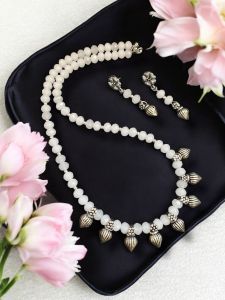 White Crystal Necklace With Kohlapuri Charms