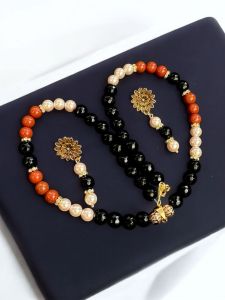 Gemstone beads with corals and pearls and black agates necklace