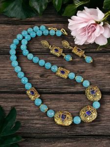 Agate beads in light blue colour with Victorian spacers
