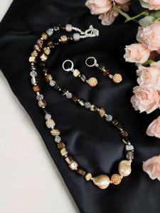 Brown Square agates with peach she’ll pearls with rhinestone balls