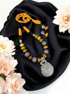 Onyx necklace with oxidised silver pendant and German silver balls and a matching cotton rope at the back 