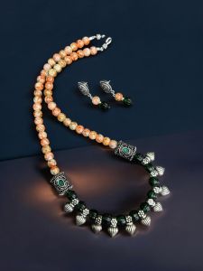 “Rangtara” : Timeless tradition and modern elegance with Orange & Dark Green Colours