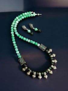“Rangtara” : Timeless tradition and modern elegance with Orange & Dark Green Colours