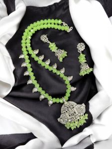 Crystal Necklace With Oxidised Silver Leaf charms and Pendant with Matching Jhumkas,Honey Brown 