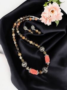 Onyx Beads with synthetic coral carved rose beads with German silver spacers with a matching earrings Cherry red