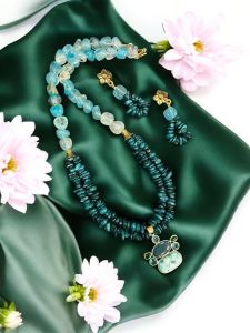 Gemstone pendant necklace with agate nuggets and mother of pearl chip beads