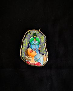 Onyx Pendant features a RadhaKrishna painting on Onyx Stones detailed with Gold foil borders