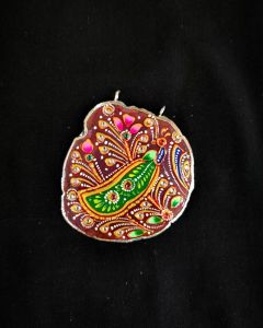 Onyx Pendant features a Tanjore painting on Onyx Stones detailed with silver foil borders