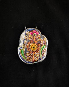 Onyx Pendant features a Tanjore painting on Onyx Stones detailed with silver foil borders