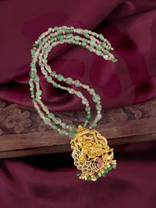 A unique Matt finish American diamond Ganesha pendant with Green Aventurine stones with pink agates