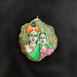 Onyx Pendant features a RadhaKrishna painting on Onyx Stones detailed with Gold foil borders
