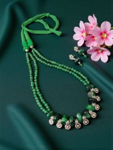 Onyx and Agate Necklace with original Kohlapuri Charms with a cotton Dori Finish along with a pair of Earrings , Green