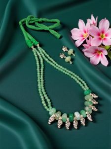 Onyx and Agate Necklace with original Kohlapuri Charms with a cotton Dori Finish along with a pair of Earrings , Light Green