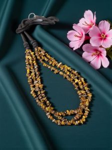 Tiger eye Necklace in 3 lines with a cotton Dori at the back