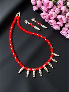 Orange Crystal Necklace With Kohlapuri Charms 