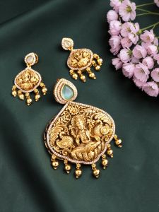 Antique Gold finish Lakshmi pendant with matching earrings