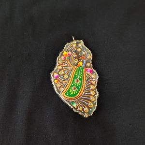 Onyx Pendant features a Tanjore painting on Onyx Stones detailed with gold foil borders