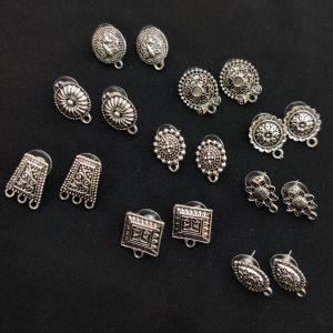 Pack of 9 Pairs of assorted oxidised silver studs with plastic stoppers